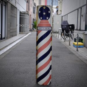 『IT PAYS TO LOOK WELL』 Porcelain Bob White Barber sign.   48 inches 9.5 wide